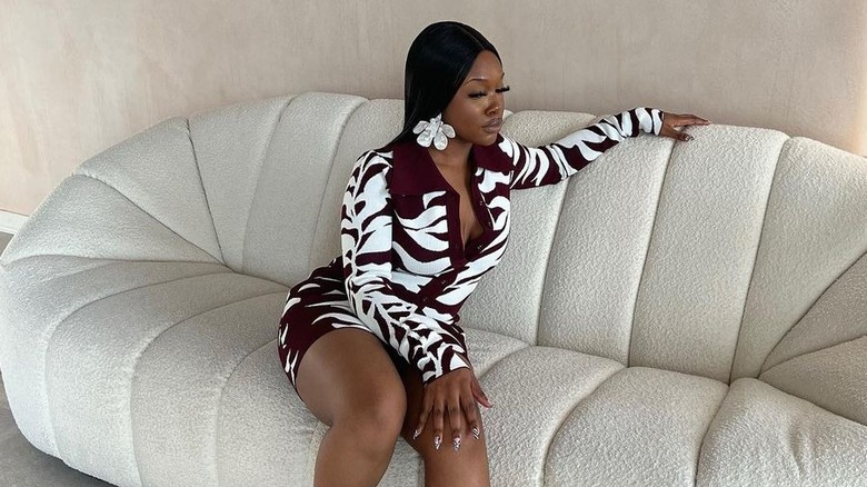 Black woman wearing printed dress