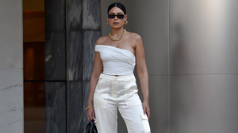 Fashionable woman wearing white clothes