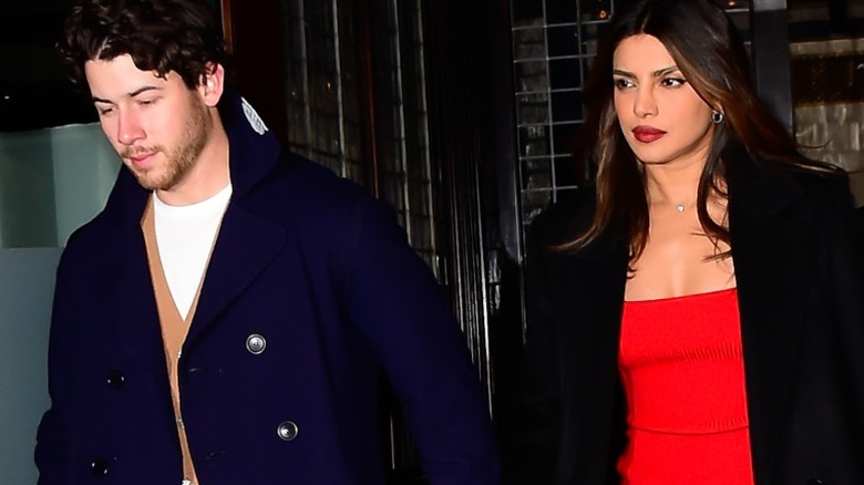 Nick Jonas and wife Priyanka Chopra hold hands