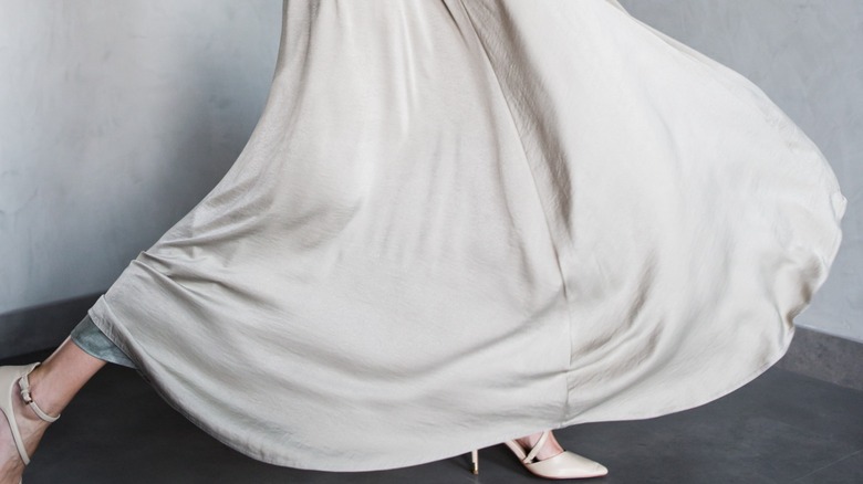 woman in long, baggy dress