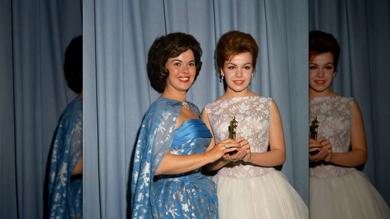 Shirley Temple giving an award to Annette Funicello in 1961