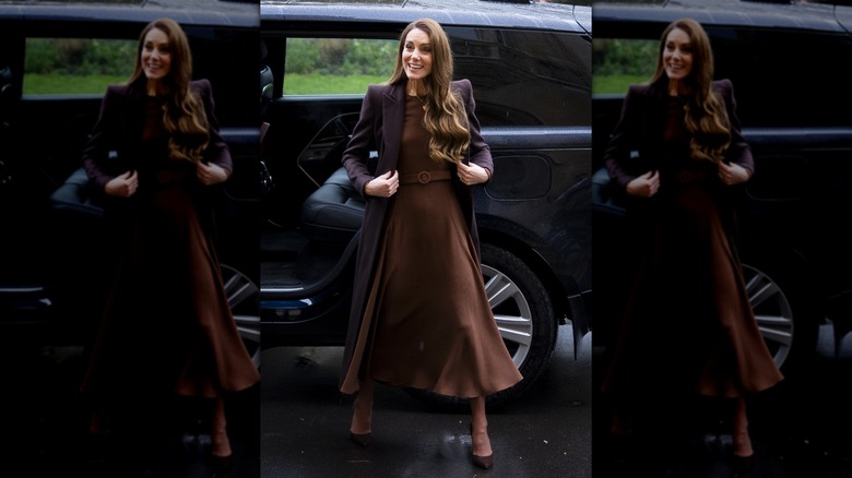 Kate Middleton in a brown dress and a dark-brown coat
