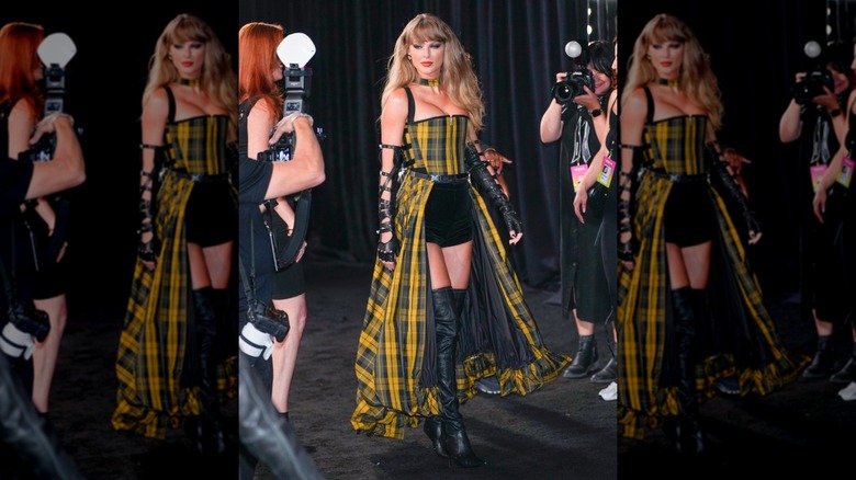 Taylor Swift at the 2024 MTV VMAs in thigh-high leather boots and shorts