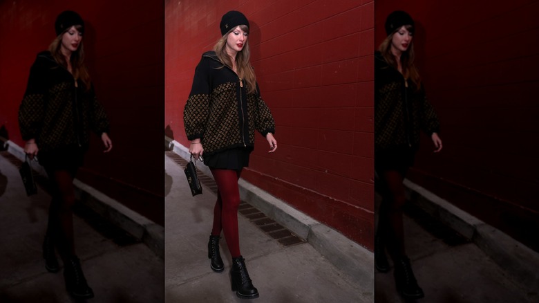Taylor Swift in a Louis Vuitton ensemble at the football