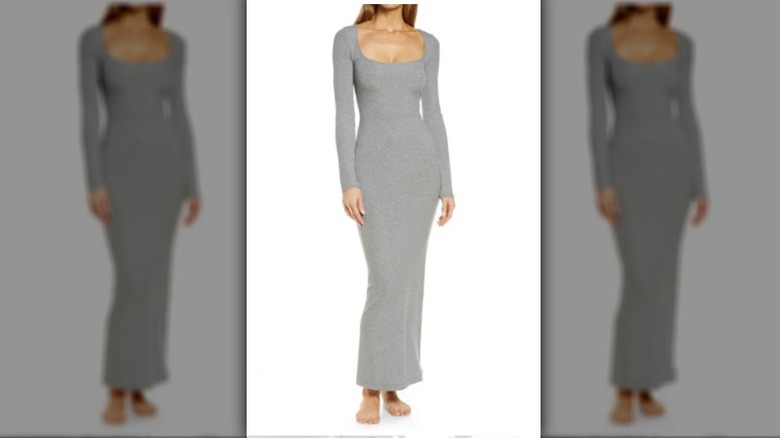 Model wearing long grey dress