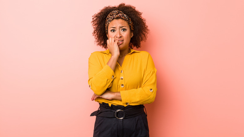 Woman looking very nervous
