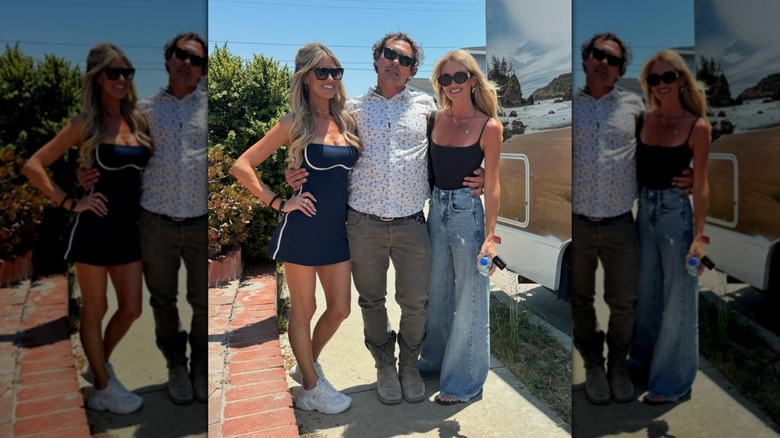 Christina Haack posing in a navy minidress and sneakers