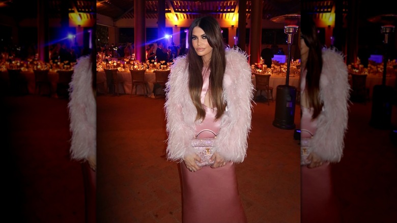 Kimberly Guilfoyle posing in a pink dress