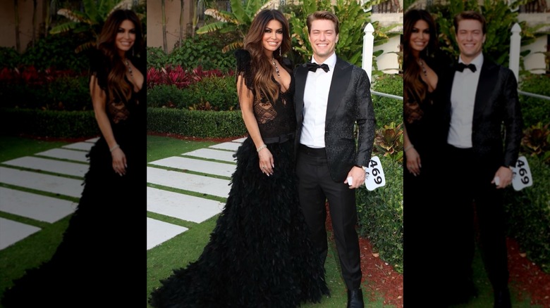 Kimberly Guilfoyle posing in a black dress