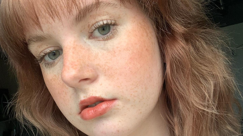 Woman wearing sunburn style blush