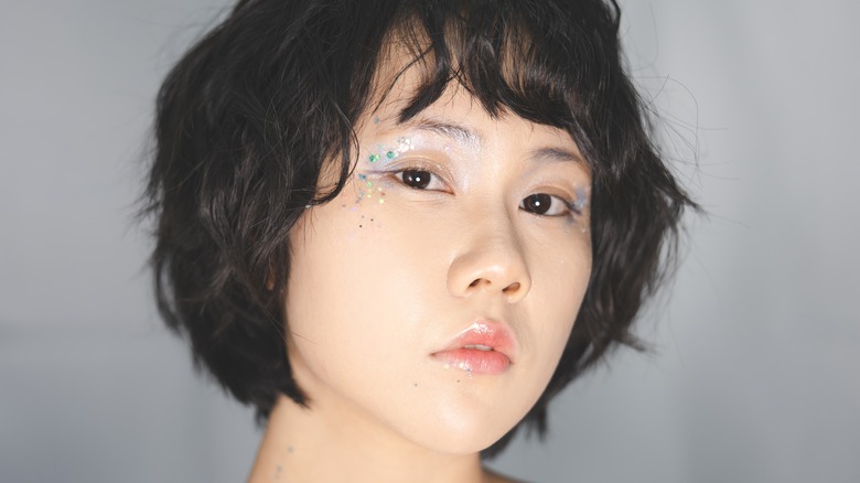 woman with glittery makeup