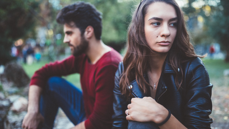 Unhappy couple turning away from each other 