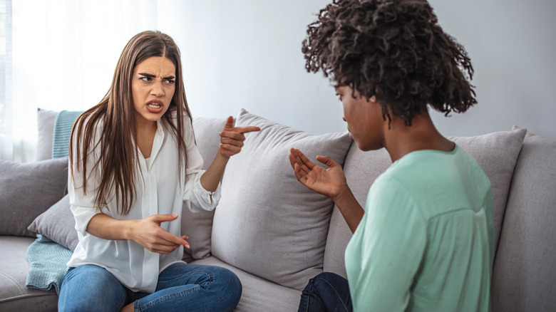 Annoyed spouse talking to partner