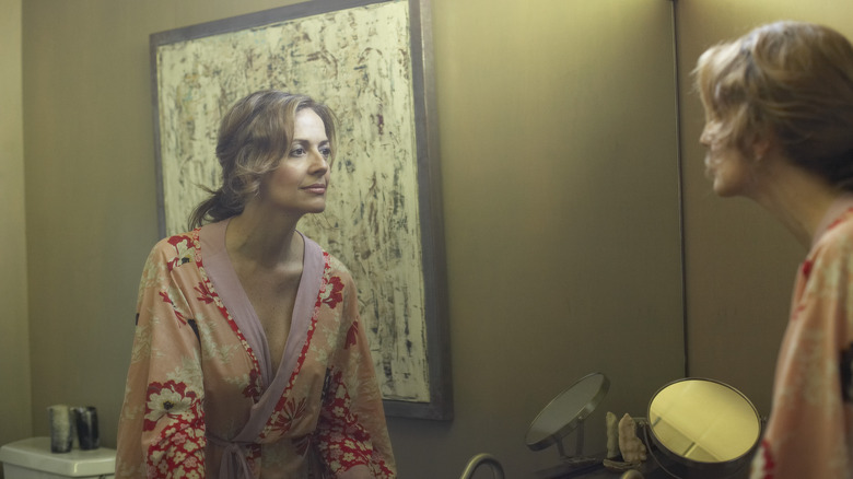 person looking in mirror