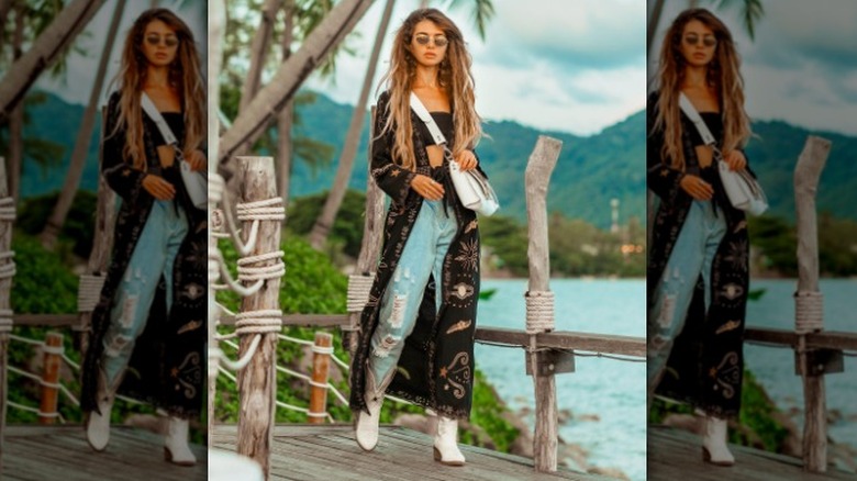 woman wearing duster coat outside