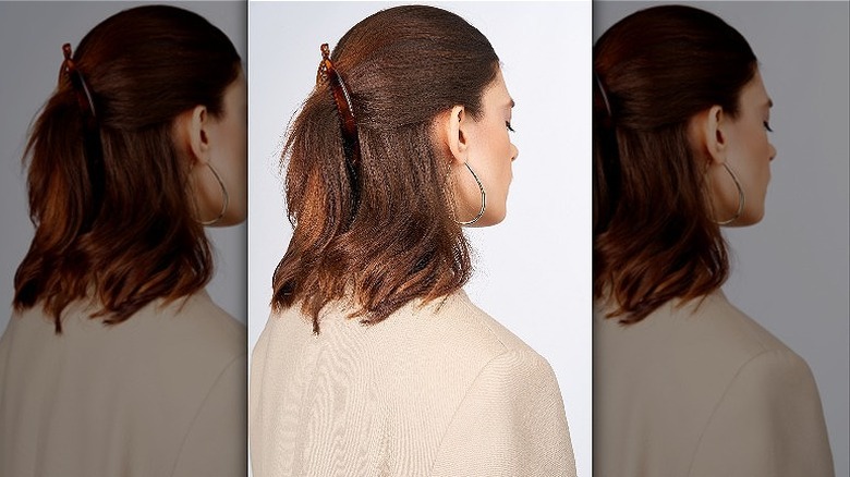 Woman wearing half-up hairstyle