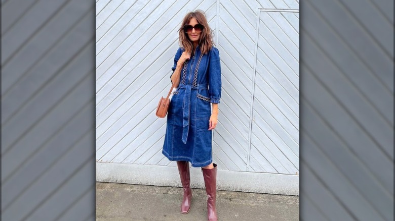 A woman in a denim dress