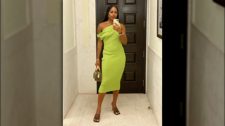 A woman wearing a midi dress