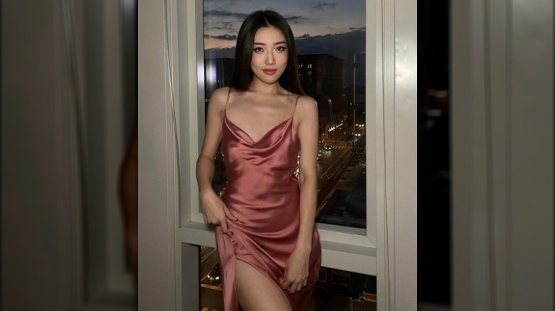 A woman in a slip dress