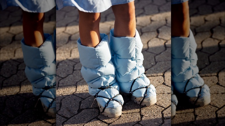 Person in blue puffy boots