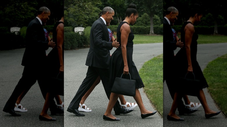 Michelle Obama wearing flat shoes while walking with Barack