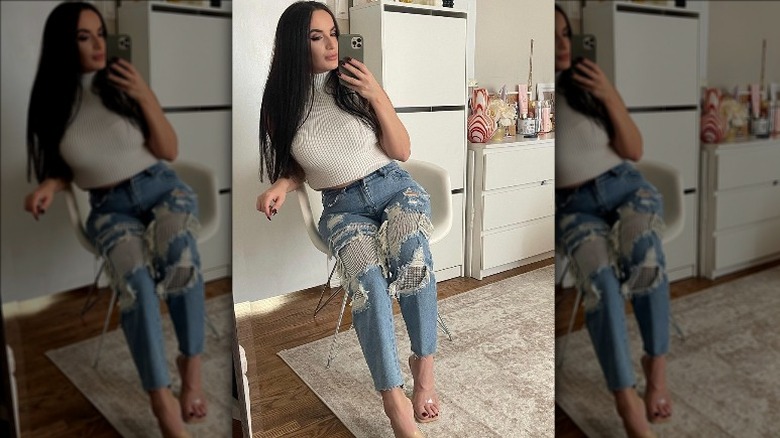 Woman in distressed denim