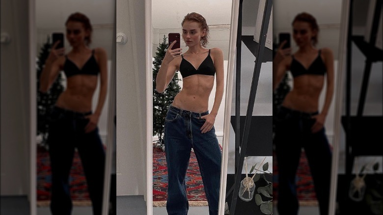 Woman wearing low-rise jeans