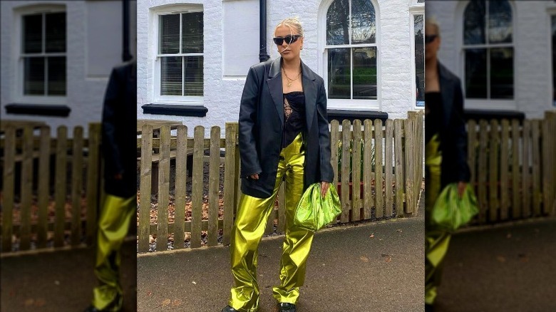 Woman wearing metallic pants