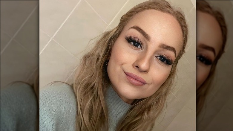 Woman with exaggerated lashes