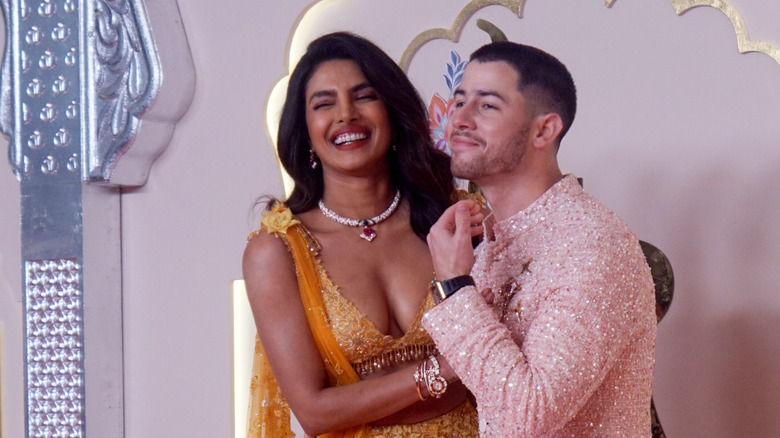 Priyanka Chopra and Nick Jonas posing together at the Lagna Vidhi of the wedding of Anant Ambani and Radhika Merchant