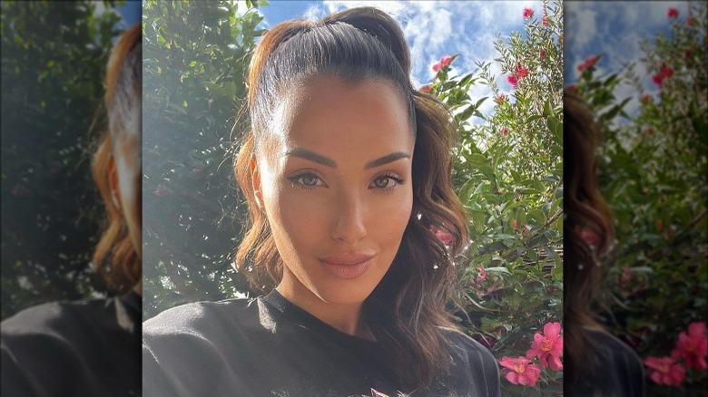 A woman with a high ponytail