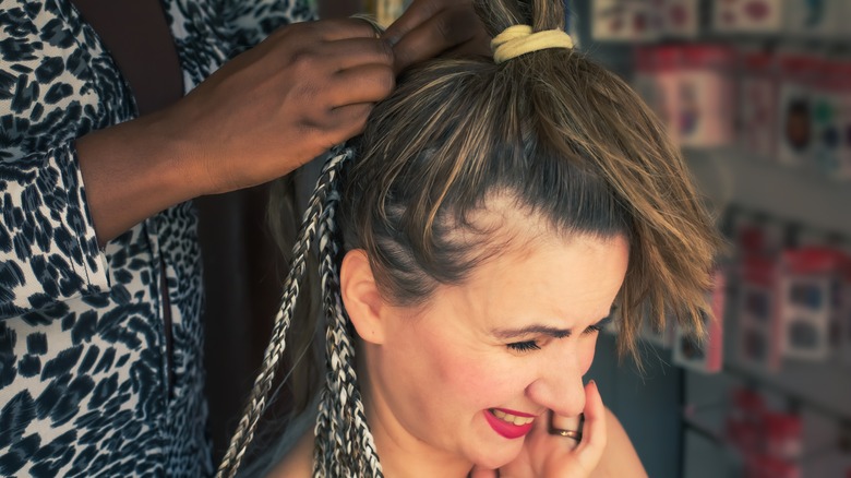 woman crying at hair salon