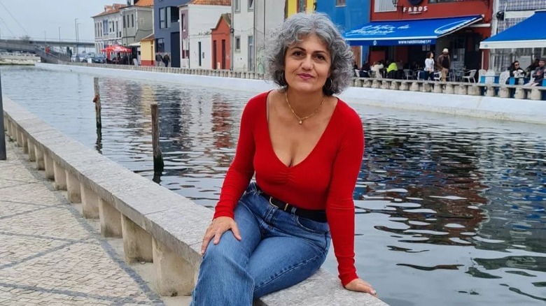 Woman with gray bob and bangs