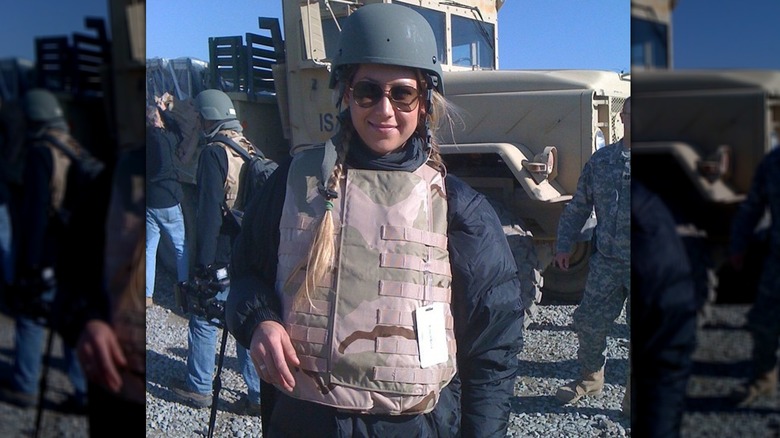 Anna Kournikova with army vehicle