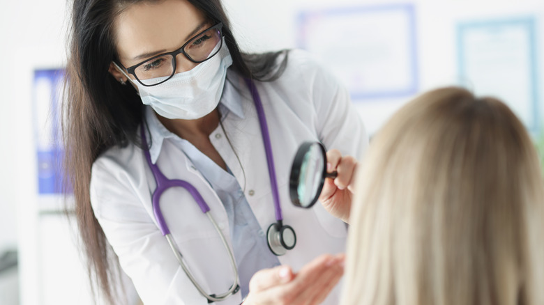 Woman at dermatologist