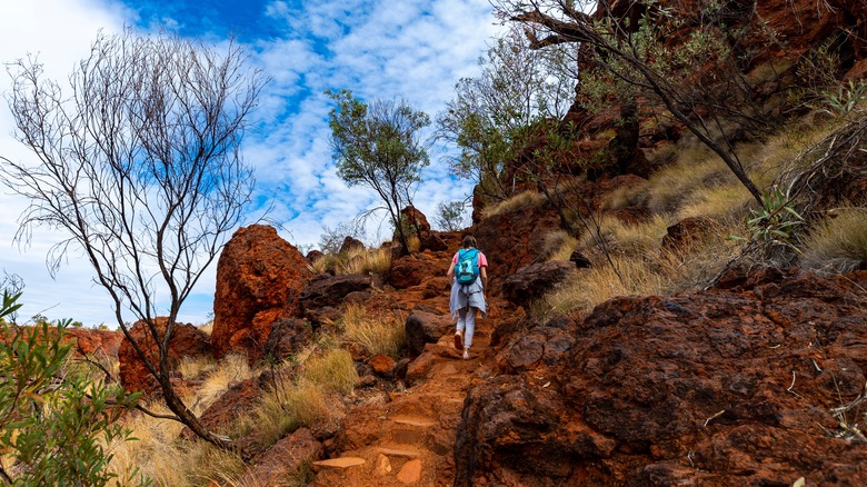Hiker woman going up hill