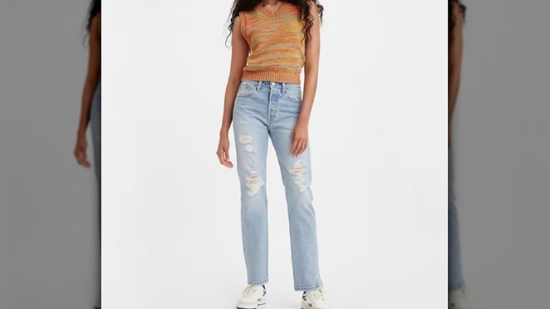 Person wearing light wash blue denim