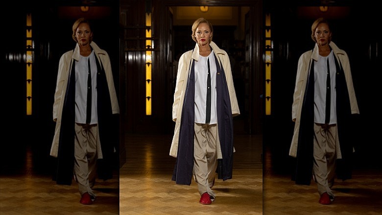 woman wearing oversized blazer on runway