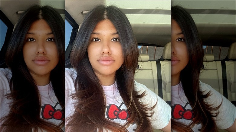 woman with medium layered thick hair