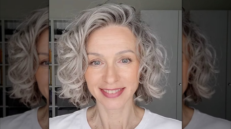 A woman with a wavy bob haircut.