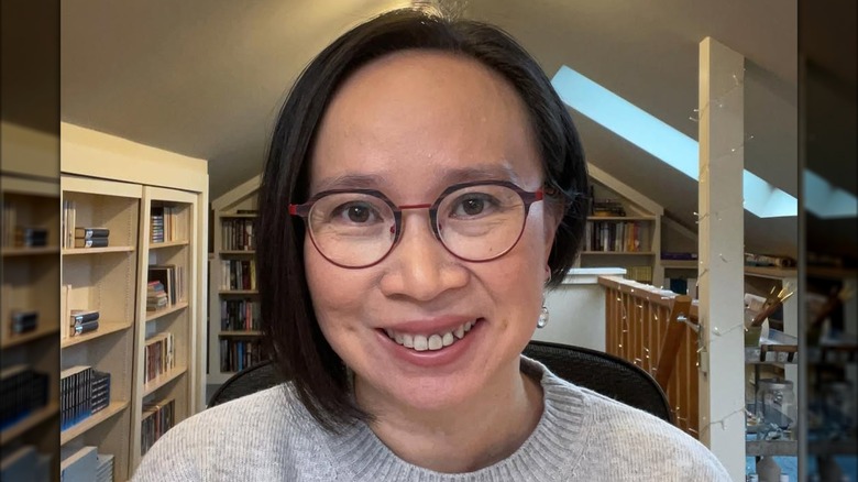 A woman with an asymmetrical bob haircut.