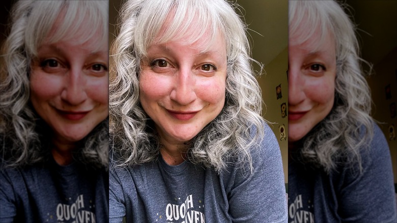 A woman with a shag haircut.