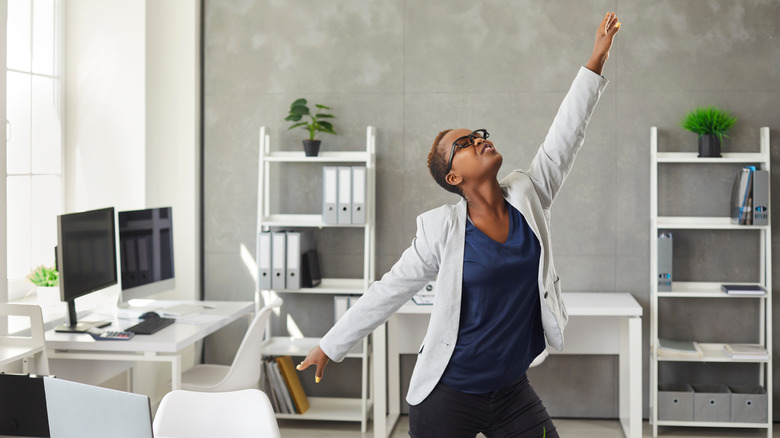 Energetic woman in office