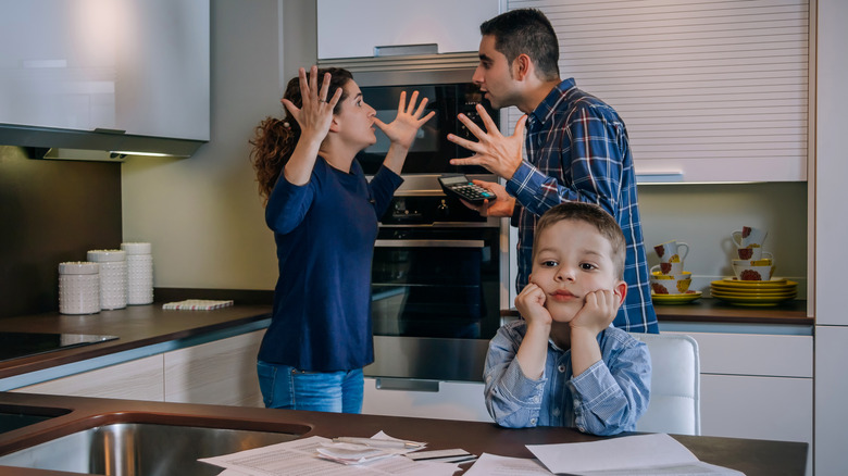 Couple arguing in kitchen