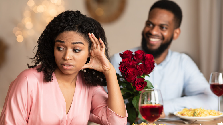 Woman looking unhappy with partner