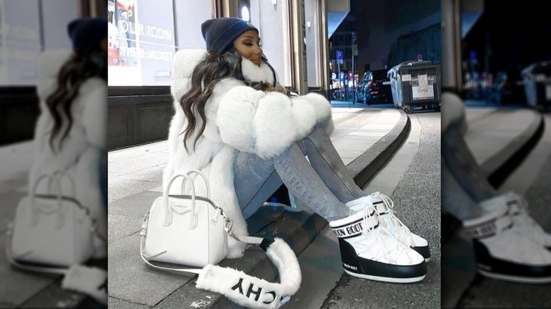 White teddy coat with a bag and boots