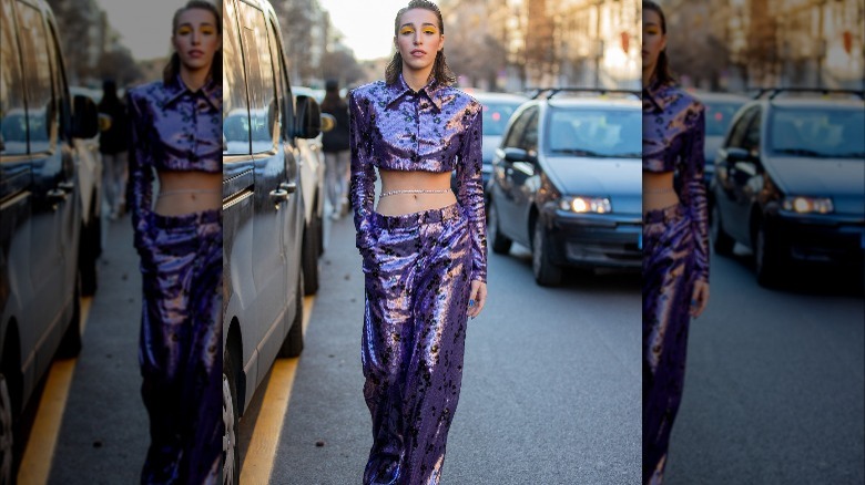 Shiny purple outfit in daytime