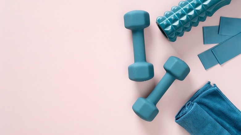 Gym supplies on pink floor