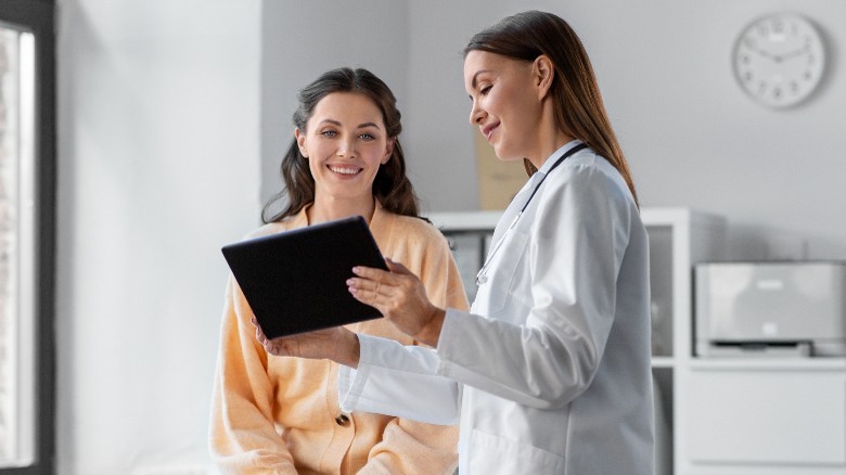 Woman talking to doctor about period