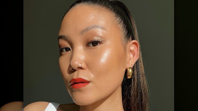 woman with orange lips